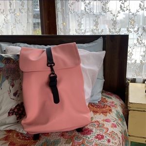 Pink waterproof Rains backpack
